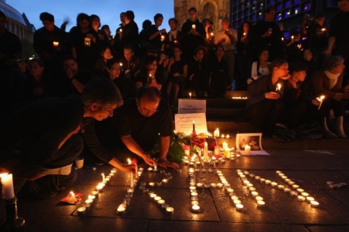 People gather for a candlelight vigil to honor the victims of recent violence in Iran.   June 25, 2009 - Berlin/Getty